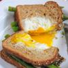 Nhanh chóng xếp lát bánh mì trứng lên lát bánh mì phô mai măng tây và thưởng thức cho nóng nào. Tùy vào sở thích mà bạn có thể chiên trứng chín hay không chín nha. Khi ăn rắc thêm chút tiêu và muối sẽ đậm đà hơn đó.