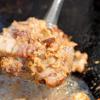 Sau đó cho thịt heo nướng vào xào đều đến khi thịt chín vàng. Tiếp đến, cho thịt gà lóc xương vào tiếp tục xào đều.