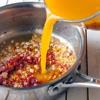 Thêm xốt cà chua, đường và nước ép xoài vào nồi, trộn đều rồi đun trong khoảng 5 phút, đến khi thấy nước trong nồi bắt đầu sôi thì tắt bếp, đậy nắp đun thêm 5 phút nữa. Kế đến để nguội rồi cho vào máy xay sinh tố xay mịn. Sau khi xay xong cho sốt lên bếp đun với lửa nhỏ để nước sốt sệt lại là được.