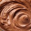 Trộn đều  hỗn hợp bơ và kem phô mai cho đến khi kem sánh mịn. Dùng rây lọc bột cacao và đường, trộn đều hỗn hợp đã lọc trong 30 giây. Thêm tinh chất vani  vào và trộn trong 2 phút.